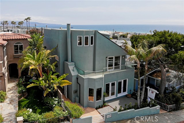 316 24th Street Hermosa Beach, California Exceptional price on a property that is basically land value but being sold with approved plans from the city of Hermosa Beach AND the California Coastal Commission! You can break ground in a matter of weeks-that is the advance of this rare opportunity. Imagine a custom-built, luxury residence with three stories of modern beauty. This 5 bedroom, 5 full bathroom and 2 half bathroom home provides just that. Featuring an incredible opportunity to build a John Starr Design modern home blocks from the beach. Approved plans are included for a 4,648 sf home. Local home designer John Starr created the ultimate design with attention to natural light and airflow. Expansive windows, open-air patios, a rooftop deck with endless vistas to the ocean, and sprawling interior plan all exemplify highly functional living. Situated in a central location to schools, parks, local boutiques, and a great food scene; not to mention steps away from the beach. Envision your new life in this innovative home surrounded by an environment that you can’t get anywhere else. Your new dream home awaits.