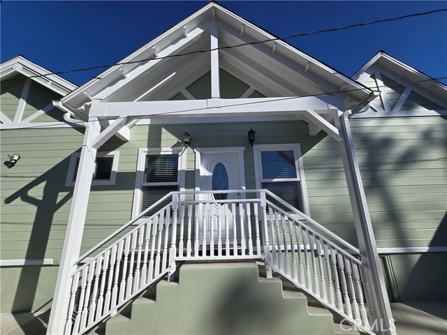Character galore. This cute porch is accessed from the formal dining room.