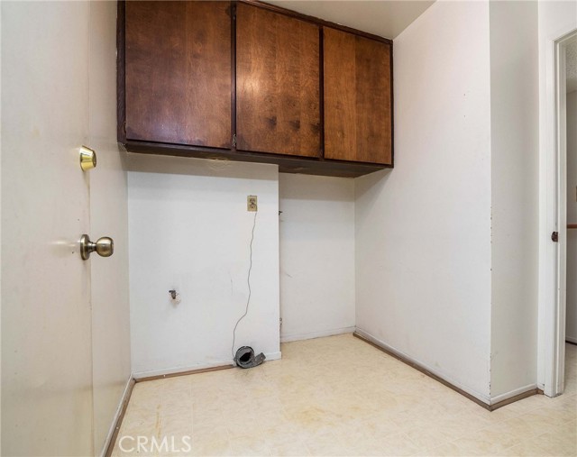 a proper laundry room next to the garage