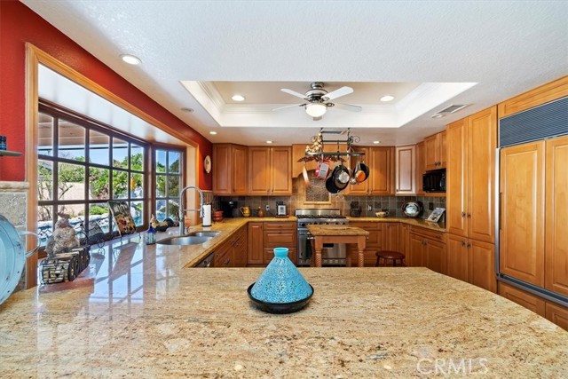Kitchen with extensive granite counters