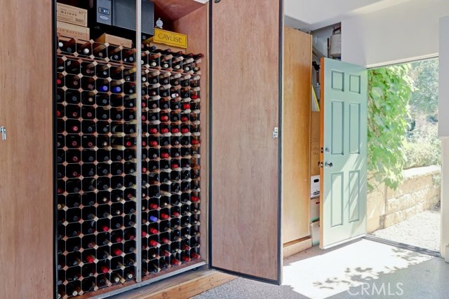 Wine collection not included in sale. Temperature controlled cabinets included.