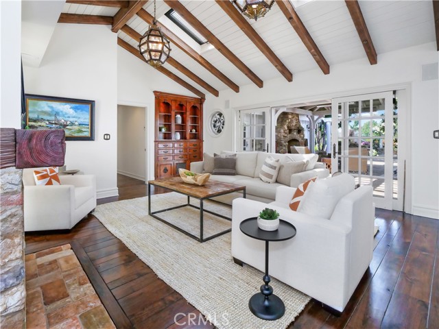 family room with slider to pavilion, vaulted ceilings