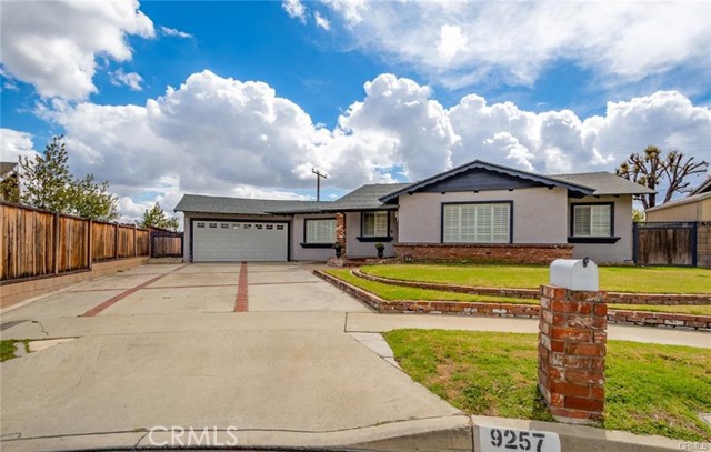 9257 Monte Vista Street Rancho Cucamonga, California Lovely upgraded 3 bedroom 2 bath home located at the end of a Cul-De-Sac street in a highly desired Alta
Loma area. Remodeled kitchen features an open concept making the kitchen the heart of the home. Featuring exquisite custom cabinetry, gorgeous backsplash, farmhouse kitchen sink, granite counter tops, stainless steel appliances and a large breakfast bar. The vast living room includes a stunning stone accent fireplace and features French doors leading to a beautiful backyard perfect for entertaining, featuring a covered patio, built in BBQ, fire pit, plenty of grass area & large storage shed. Garage features epoxy flooring and cabinetry creating an organized look.