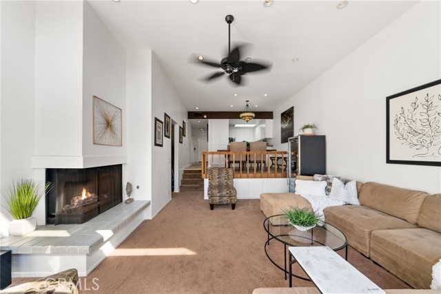 Looking to the dining room and kitchen.