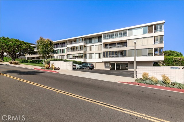 Front of building. 1 parking space under the building, 1 exterior parking space.