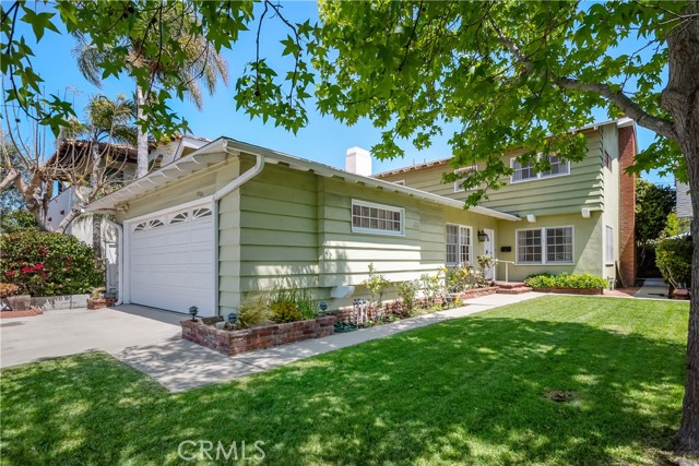 3204 Maple Avenue Manhattan Beach, California Located mid block on a great street, this well loved home hasn't been on the market since new. The grassy front yard and flower-lined walkway lead you to the front door. Enter and you will find a traditional open floor plan featuring a spacious living room with brick fireplace and a built in bookcase. The living and dining rooms overlook a large and private grassy backyard. A kitchen, breakfast bar and breakfast area offer space to create a dream kitchen. A 4th bedroom or den, half bath and laundry complete the first level. There is also direct access to a 2-car garage. On the second level you will discover a master bedroom with attached bath, 2 additional bedrooms and a full bath. This home has great bones and ready for a new Buyer to call it home.