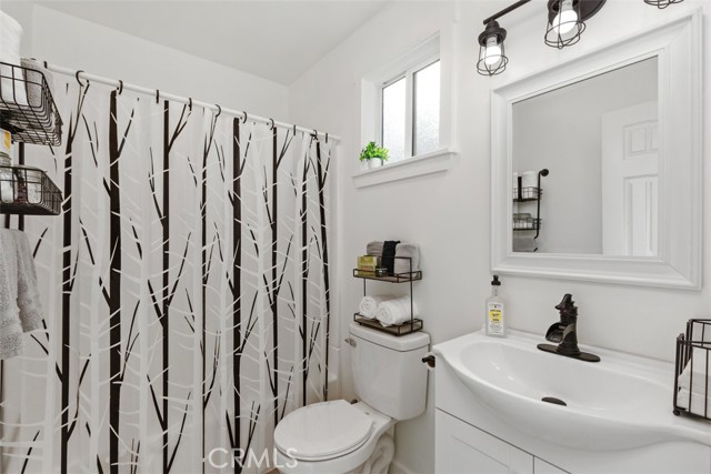 Renovated bathroom off of primary bedroom.