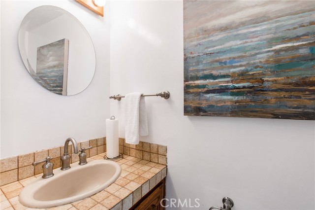 downstairs half bath off of living room