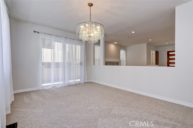 Light filled dining room with access to 1 of 3 decks on this level