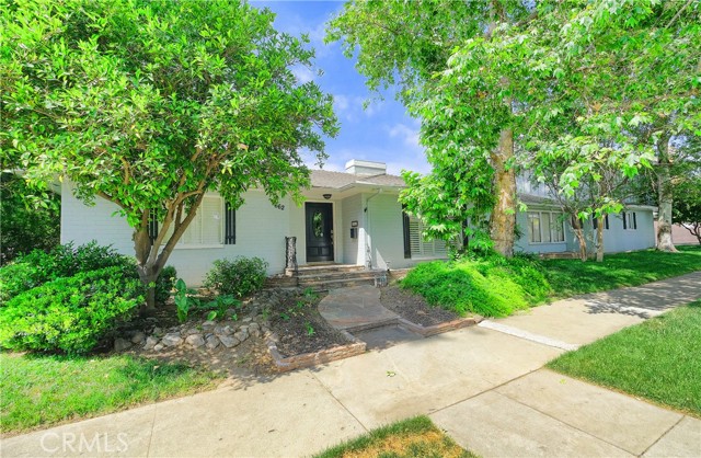 662 N Laurel Avenue Upland, California Gorgeous 4 Bed/ 3 bath home situated on a beautiful treelined street surrounded by characteristic properties!! This charming single-family home is perfect for your growing family! Open and spacious floor plan. Large living room with inviting fireplace. Dining room with built-in hutch. Large kitchen with eating area. Crown molding and plantation shutters in living room and dining room. Family room with wood burning fireplace. Bonus room with large wet bar perfect for entertaining. French doors open to the sizable yard. 3 good sized Bedrooms downstairs and Master suite is upstairs. Master suite has its own fireplace, bathroom, walk-in closet and mountain view. This home features ceiling fans, indoor laundry with cabinetry, lots of storage, 2 car garage, RV parking, alley access, and an additional spacious outside storage area. Conveniently located in the desirable UPLAND area. Close to parks, schools, restaurants, shopping and historic district.