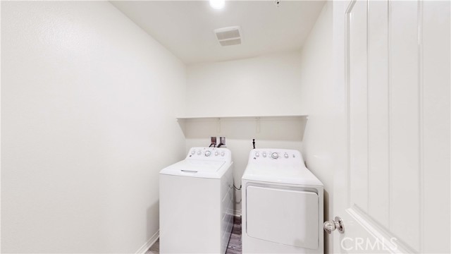 Separate laundry room upstairs