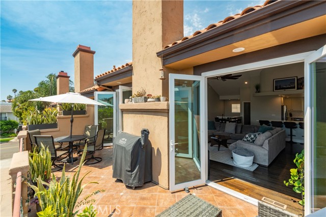 Private Deck off Living Room hi-lited by its tiled floor.