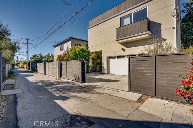 2 car garage with side carport and additional parking