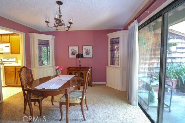 Formal dining room with sliding glass doors to back yard.