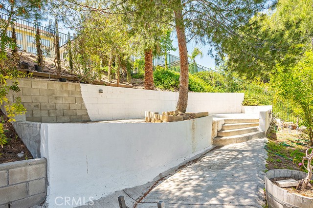 Detail Gallery Image 52 of 62 For 14846 Narcissus Crest Ave, Canyon Country,  CA 91387 - 5 Beds | 2/1 Baths