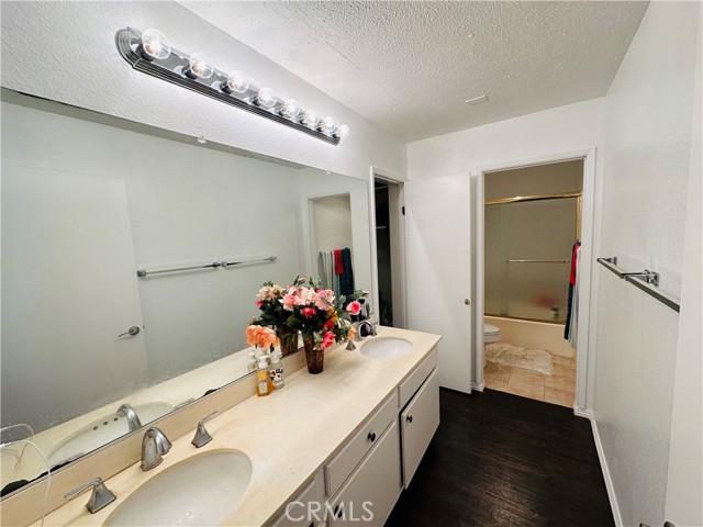 Master bathroom sinks with walk-in closet
