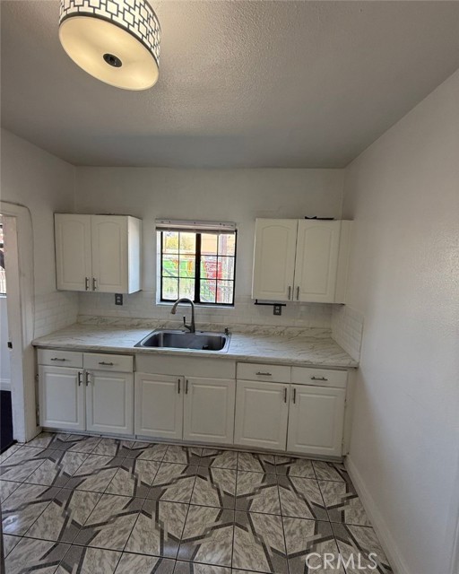 Kitchen Sink and Cabinets