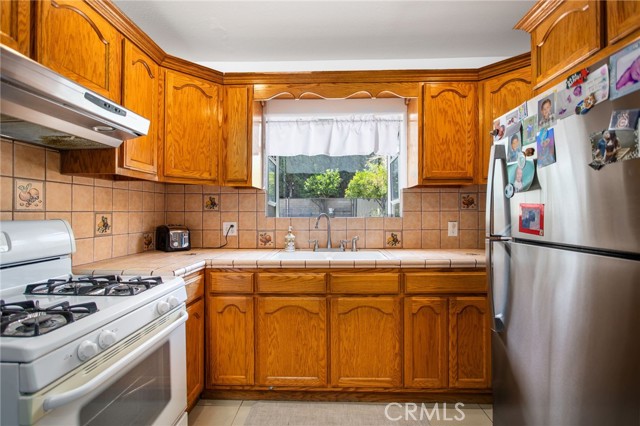 Detail Gallery Image 26 of 51 For 13828 Cowley Ave, Bellflower,  CA 90706 - 4 Beds | 2 Baths