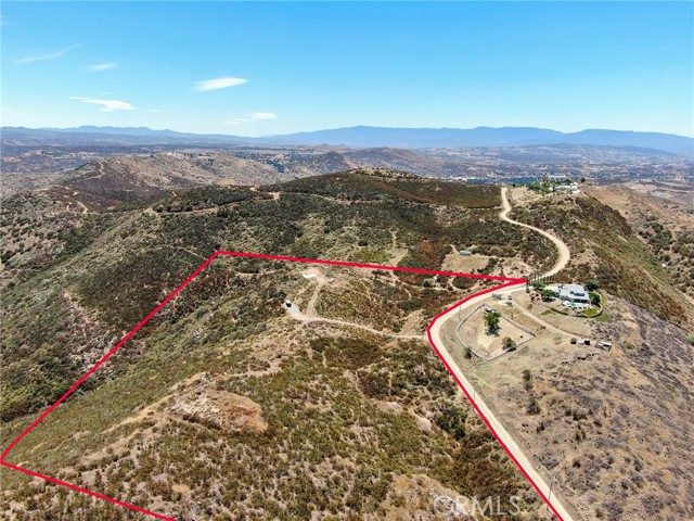 drive way & pad area a top of property. Electricity is at the property for the well.