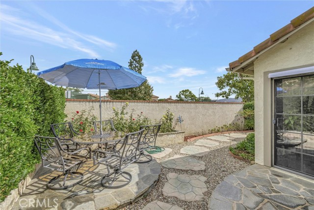 patio area with access to primary bedroom