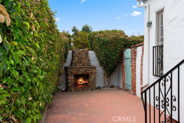 STONE FIREPLACE, AND PRIVATE BACKYARD COURTYARD