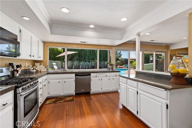 Kitchen has ample space for creating your culinary dreams. Freshly painted cabinets and updated counter tops.