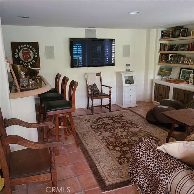 Downstairs family room with a bar