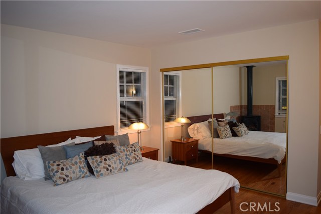 Master bedroom, mirrored closets.