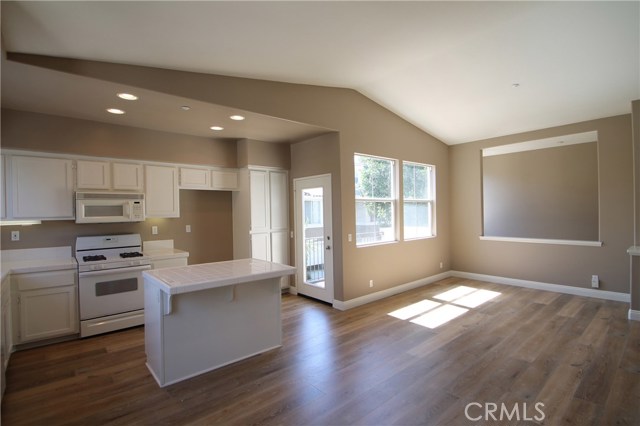 photos from prior to last tenant, now with curtains & new stainless steel appliances incl refrigerator