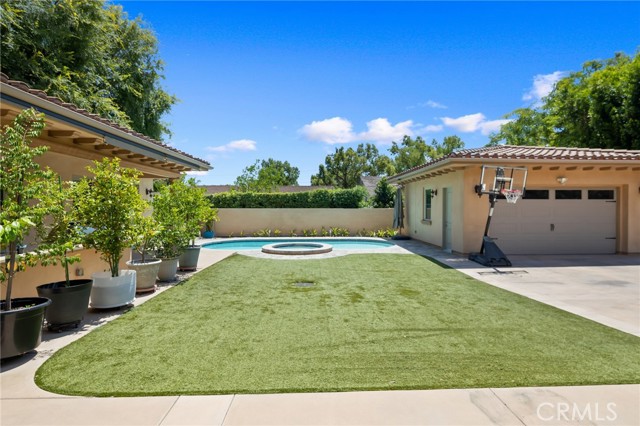 pool house, pool and two car detached garage