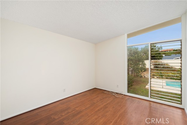 3rd Bedroom with backyard/pool view