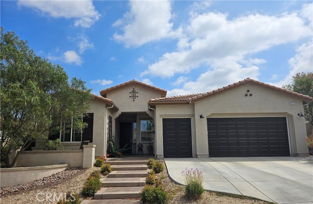 'MONTAGE' says it all - Not Many of these Models come up, and they don't last.  AWESOME FLOOR PLAN w/One Story 2018 Home (TWO Primary Bedrooms 'En Suite' + Den + 3 Bathrooms - 2,412 SF) with FABULOUS UPGRADES: Hi-End LVP Flooring, Carpet in BR; Crown Molding; Formal Dining Rm; Upscale, Spacious Country Kitchen with Eating Area and Large Breakfast Bar has Alaska Quartz Counters w/full Backsplash, SS Appliances, 2 Convection Ovens, 5 Burner Stovetop & a Pot Filler over Stove; Bathrooms have Italian Quartz & Rain Glass; Country Cottage Cabinetry throughout (Bead n Board); Custom Paint; Cozy Fireplace; Surround Sound; Classy Bay Window in BR; Custom Lights & Fans and Rubbed Bronze Fixtures throughout; Large Laundry Room with Storage.  3 Glass Inset Doors lead to a Fully Fenced & Landscaped Yard which offers: Alumawood Patio Cover; Attractive Stamped Concrete, Built-in Seating/Conversation Area around Gas with Glass Fire Pit, Planter Beds & Grassy Area.  The Garage has parking for Three Vehicles (2 Cars + Golf Cart or ?) and Overhead Storage Bins.  FOUR SEASONS features: Restaurant that Delivers; THREE Club Houses; Beauty Salon; Massage Parlor and Facial Salon; THREE Swimming Pools & Spa Areas with one Indoor Heated Pool; Movie Theatre; Billiards, 3 FITNESS CENTERS with state-of-the-art equipment, BBQ & Picnic Areas, Tennis Courts; Pickle Ball/Paddle Tennis, Shuffleboard, Horseshoe and Putting Green, 6+ MILES of Nature/Hiking Trails; DOG PARK, and So Many Wonderful Activities & Clubs to meet new Friends and be as Active as you choose. FOUR SEASONS is approximately 30 miles from Palm Springs, at a higher elevation for a cooler climate to experience all of the four Seasons; Close to Shopping Centers, (including the World Famous Cabazon Outlet) Restaurants & Casinos, MEDICAL CENTERS/FACILITIES (Literally across the street from Loma Linda & Beaver Medical) - This Picturesque Community is surrounded by rich ranch lands with a Scenic backdrop of 2 Mountain ranges.