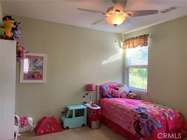 Another good size bedroom with mirrored closet.