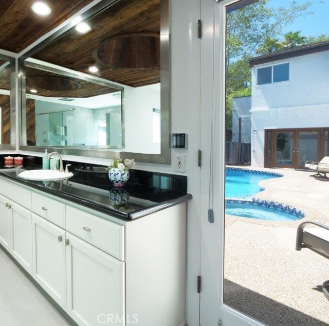 Primary Bathroom door to Pool Area