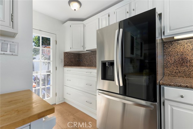 Do NOT miss the walk in pantry just around the corner w/ direct access to back yard here too!