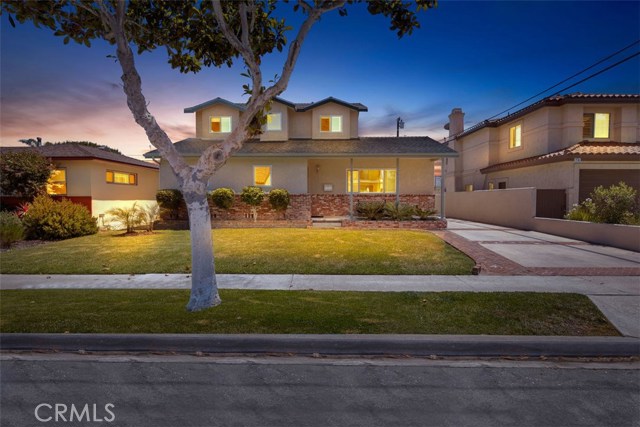 2726 Fisk Lane Redondo Beach, California The perfect home for the large family. Delightful 5 bedrooms, 3 bath family home on a peaceful tree-lined street near Franklin Park. Well designed and perfect for entertaining. With its stunningly bright and cheery kitchen and oversized family room with cozy brick fireplace all opening to your private backyard oasis with a built-in BBQ and entertaining island. The rooms are spacious, bright and airy giving everyone enough space for their own privacy. Well maintained home in one of Redondo Beaches highly sought after neighborhoods "El Nido". Children and growing families will love the friendly neighborhood where children play and families all look out for one another. Nestled in the Heart of Redondo Beach, near Award Winning Schools, Shopping, Parks, and close to the Beach. Traditional floor plan with 3 bedrooms and 2 baths upstairs and 2 bedrooms 1 bath downstairs. Spacious and open living room and separate formal dining area along with the kitchen and family room in the back of the home for family gatherings. Many features included, hardwood flooring, plush carpeting, retrofitted windows, 3 attic storage rooms, tons of closet space, bright open kitchen with garden window and all appliances, separate laundry room, and oversized 2 car detached garage. Newly installed interior doors, freshly painted, and lovely landscaped front and rear yard with custom pavers and brickwork. You can build a separate mother in law quarter's see ADU requirements supplement.