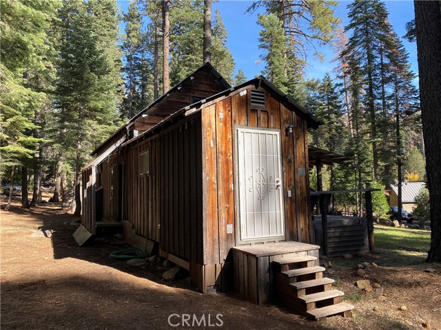 Alternative Entrance Leads to Indoor Laundry and Storage Area