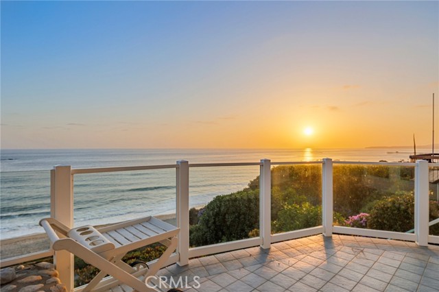 Spectacular Single Family Residence property with an awesome panoramic view of the ocean. Residing on a bluff that has a walkway from the back of the property down to the beach. Custom built back in 1986. Enter the property on the first level and step in to enjoy the Living Room with fireplace. A bar area then separates the Living Room from the Family Room with gorgeous views to the outdoor paitio. There is also a fireplace in this room. The Dining Room also overlooks the patio and has its own beautiful view of the Ocean. The Kitchen includes an eat-in area that also overllooks the patio and ocean view. Appliances include a refrigerator, gas oven, microwave. dishwasher, trash compactor and wine/ beverage cooler. A bay window above the double sink adds to the ambiance of this area. Two bathrooms are on the first level. One is a full bathroom and the other is a half bathroom. Inside laundry with a sink and plenty of storage completes the first level interior. Step out back to the outdoor patio to enjoy the soothing views from the seating areas or the inground rectangular spa. We travel upstairs to the second level and walk in to the primary bedroom that once again overlooks the Pacific Ocean. This room also has its own fireplace and opens out to the second level deck. The deck includes a new glass wall for your safety and security. The primary full bathroom includes a spa tub and a separate shower. There are three additional bedrooms on this level with one of the bedrooms set up as an office with stunning views of the ocean. There is another full bathroom on the level as well. there are many other features that are available to come and see with an onsite visit to this spectacular property. Oh by the way, we also have a three car garage and a circular driveway that provides plenty of parking and inside storage. Come take a look at this riveting opportunity to enjoy the dream of living here!