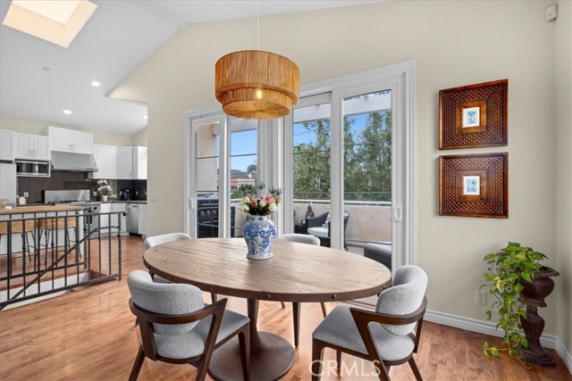 Dining toward kitchen & front patio.