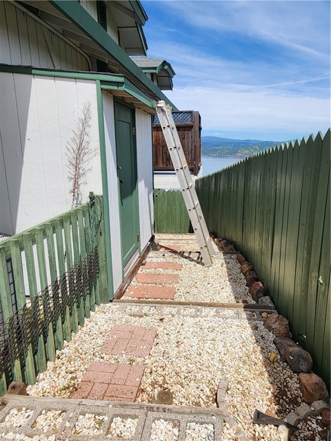 Side yard shed off garage