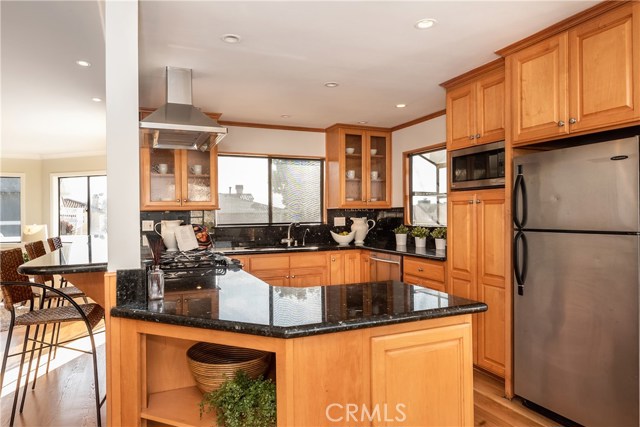 Breakfast bar provides sightline to living room