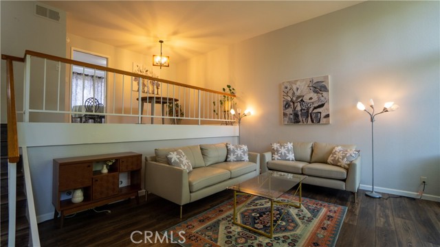 DINING AREA ABOVE LIVING ROOM BEAUTIFUL