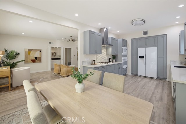 Dining open to kitchen and living room