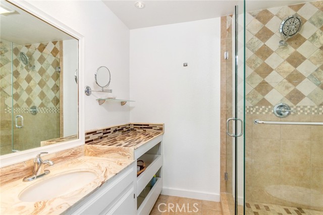 one of 2 renovated bathrooms