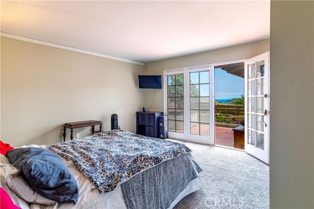 Primary bedroom with Ocean View and private bath