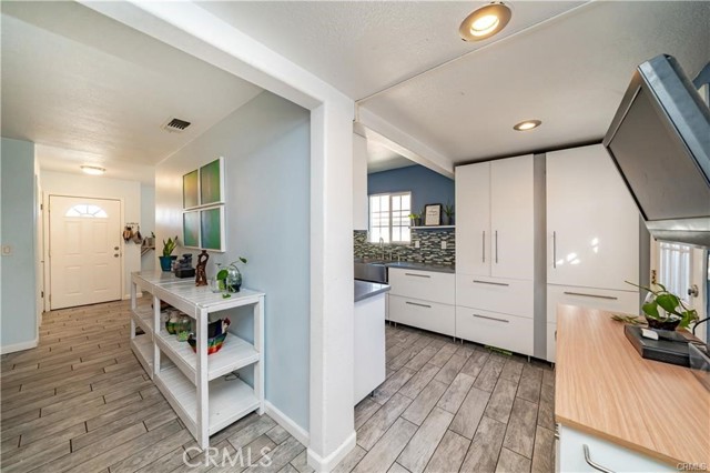 angle view of living room and kitchen