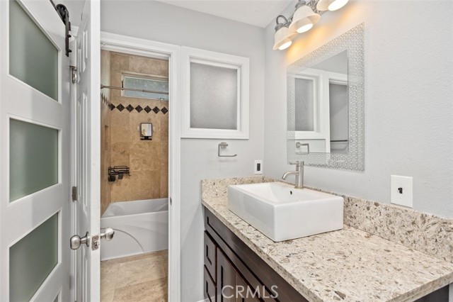 BATHROOM LOWER LEVEL - LARGE WALK IN CLOSET ON LEFT