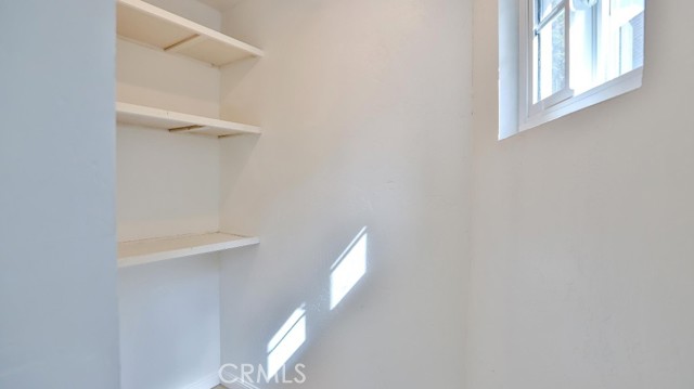 Upstairs bedroom walk in closet