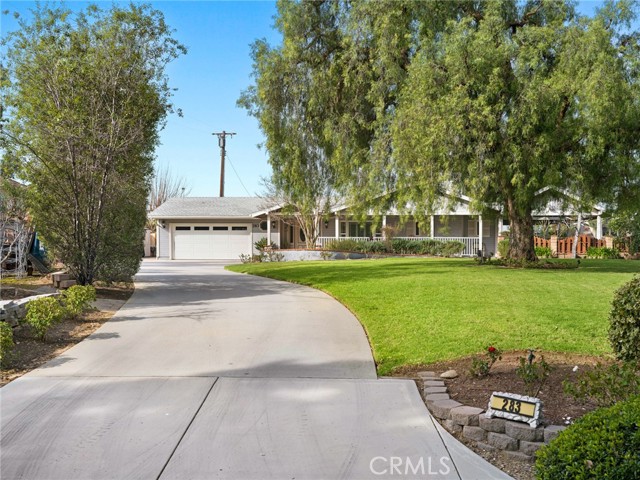 Welcome to 283 S, Del Giorgio Rd, a beautiful single family residence located on a private road in the City of Anaheim Hills.  Available for the first time in nearly 40 years, the home features 3 bedrooms, 3 1/4 bathrooms, 2,573 SF of living space, and is situated on an approximate 25,200 SF flat lot.  Upon approaching the home from the huge front yard, you will immediately notice a large front porch, perfect for enjoying your morning coffee.  The large entryway makes way to the open family room with vaulted ceilings and fireplace.  Adjacent to the family room is the stunning, recently remodeled kitchen, featuring white shaker cabinets, quartzite countertops, dual ovens and Bosch stainless steel appliances.  There are two primary bedrooms with one of them boasting beamed ceilings, fireplace, walk-in closet and large open den that could easily be converted to an office.  The spa like ensuite bathroom has also been recently remodeled featuring quartzite countertops, dual sinks, and oversized custom tiled shower.  French doors lead to a private Pebble tec pool and spa with relaxing waterfall feature.  The approximate 935 SF covered patio with vaulted ceilings is an entertainers dream featuring an outdoor kitchen with oversized redwood bar and rooftop deck.  Other impressive features include LVP flooring, oversized 2 car garage, Culligan whole house water filtration system, RV/Boat storage, renovated laundry area with utility sink, and an abundance of fruit trees.  Close proximity to shopping, dining, major freeways, and award winning schools.  This is one home you do not want to miss!