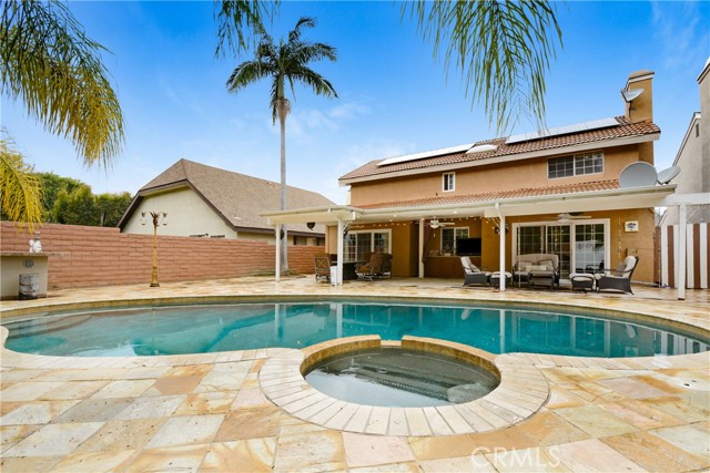 Stunning Anaheim Hills Pool Home Near Yorba Regional Park and Top-Rated Schools

Nestled in the highly desirable community of Anaheim Hills, this beautiful two-story pool home is perfectly located opposite the scenic Yorba Regional Park, known for its serene boat rides and picturesque trails. The home is also directly across from the acclaimed Woodsboro Elementary School, providing unparalleled convenience for families, and is just minutes away from major freeways. In addition, popular stores such as Costco, Home Depot, Kohl's, Best Buy, and a variety of restaurants are all within walking distance, ensuring everyday conveniences are at your fingertips.

Boasting 4 spacious bedrooms, including a luxurious master suite with his and hers mirrored closets, this home offers a perfect blend of style and comfort. The bathrooms have been tastefully remodeled with granite counters and elegant porcelain marble flooring, imported from Egypt, which adds an extra touch of luxury. Enter through dramatic double doors to a grand foyer with an open floor plan, soaring ceilings, recessed LED lighting, and an abundance of natural light. The timeless interior finishes include stone accents, bright designer paint, wallpaper, and custom-ordered curtains, all complemented by hand picked designer lighting fixtures.

The gourmet kitchen features granite countertops and stainless steel appliances, ideal for culinary enthusiasts. Other upgrades include porcelain flooring with granite accents, sophisticated crown molding, and a striking wrought iron staircase. The home is equipped with a water softener, reverse osmosis system, a brand new A/C unit with added 18 paid solar panels and a new water heater  adding both comfort and energy efficiency.

Step outside to your own private oasis, featuring a resort-style pool and spa that are beautifully maintained. The pool showcases exquisite stonework inside, enhancing its elegance and appeal. The spacious backyard is perfect for entertaining, with a custom-designed pool area, a covered patio, and a built-in gas BBQ, surrounded by lush gardens and mature trees. The pool area features beautiful stonework inside the pool and has been meticulously cared for. Best of all, NO MELLO ROOS and NO HOA DUES!

This home truly has everything you've been looking for. Don’t miss the opportunity to make it yours today!